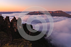 Three Sisters and Mt Solitary with a cloud inversion
