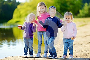 Three sisters and their brother having fun