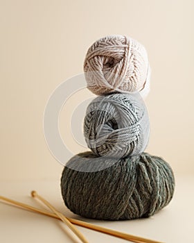 Three skeins of yarn. Nice photo for a hobby, vertical orientation. Hobby aesthetics.