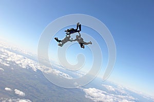 Three skydivers after existing an airplane