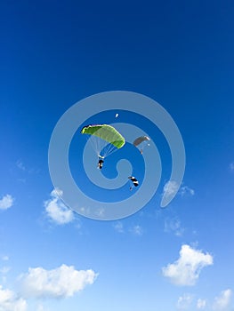 Three skydivers in the sky, Cuba, Varadero