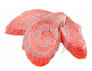 Three slice of red meat isolated on white