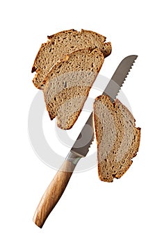 Three slices of fresh rye bread with bread knife