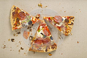 Three slices of pizza