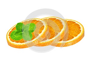 Three slices of sweet juicy orange fruit with mint herb isolated on white