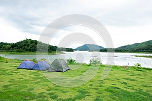 Three small camping tents at Kaeng Krachan Dam, Thailand