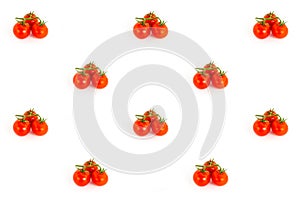 Three small tomatoes red cherry branch, group of berries on a white background pattern contrasting juicy base