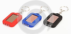 Three small trinket LED torch