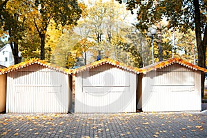 Three small wooden houses