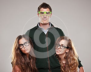 Three smart student friends looking with eyeglasses