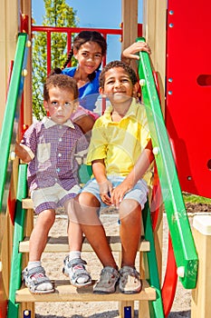 Three smiling kids