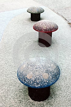 Three snow covered toadstools