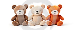 Three soft toy bears sitting in a row on white background