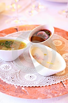 Three soups in bowls photo