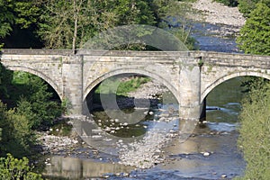 Three span stone bridge