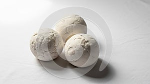 Lighting is subtle highlighting the intricate details and textures