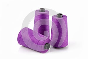 Three Spools of Purple Thread