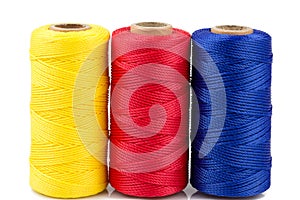 Three spools of thread isolated