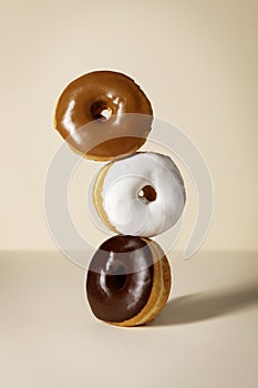 Three Stacked Glazed Donuts