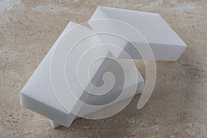 Three Stacked White Melamine Sponges