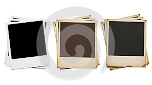 Three stacks of blank instant photos