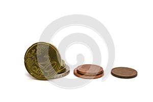 Three stacks of euro cents coins on a white background