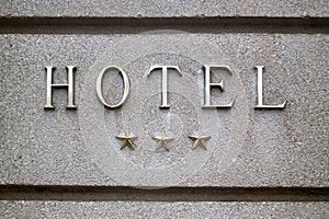 Three stars hotel sign