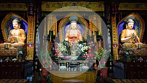 Three statues of Buddha at a Temple, Beijing, China