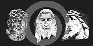 Three statues of Christ on black