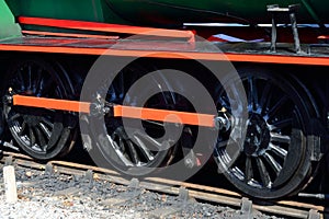 Three steam train wheels