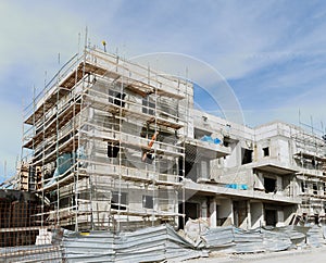 Three-storeyed apartment building under construction
