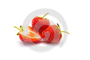 Three strawberries isolated on white background.