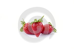 Three strawberries on a white background, isolate
