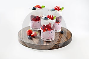 Three strawberry desserts with mint