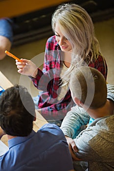 Three students doing homework in the library
