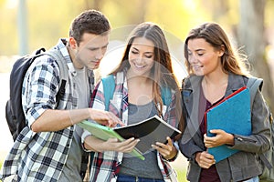 Three students learning reading notebook