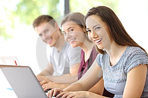 Three students looking at you at classroom