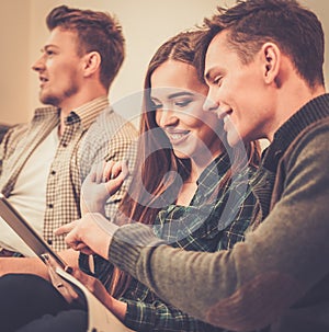 Three students preparing for exams