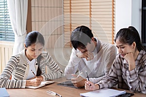 Study Group and Collaboration. Students engaged in focused study session, sharing ideas and notes.