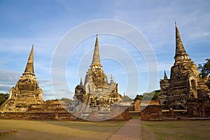 Three stupas of the ancient Buddhist temple of Wat Phra Si Sanphet at dawn. Ayutthaya. Thailand