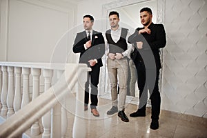 Three stylish bearded man well dressed posed. Musician band guys