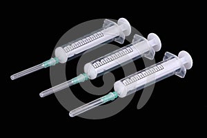 Three syringes
