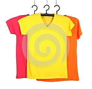 Three t-shirt template on hange isolated on white
