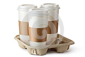 Three take-out coffee in holder