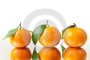 Three Tangerines Closeup