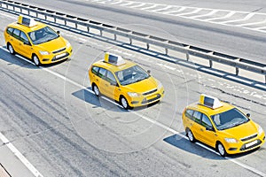 Three taxis on motorway