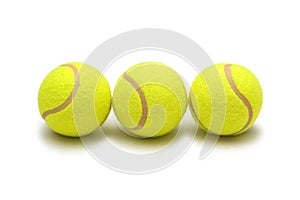 Three tennis balls isolated