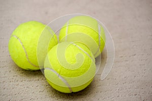 Three tennis balls on isolated background