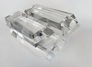 Three thick acrylic rectangular shapes with a white background