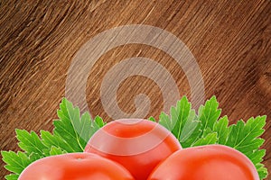 Three tomatoes with leaf on white background.